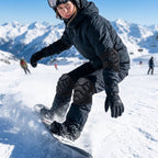 Snowboarder wearing Pactline protective pads on the mountain