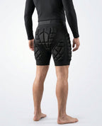 Back view of Pactline snow impact shorts in studio